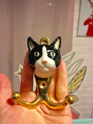 Percheros Gato