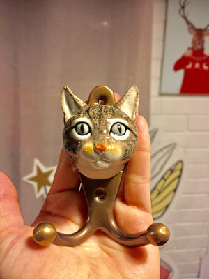 Percheros Gato